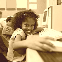 child at computer; courtesy Microsoft images